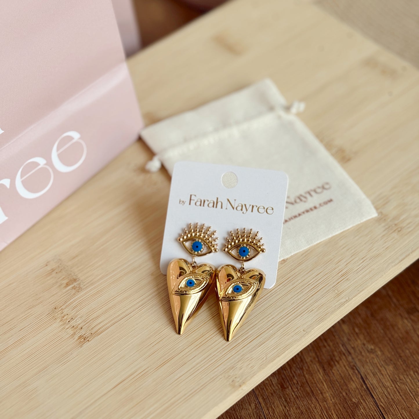 Aretes Evil Eye